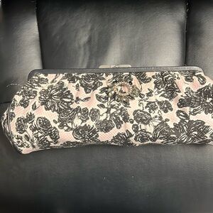 This is new condition Ann Taylor Clutch Bag